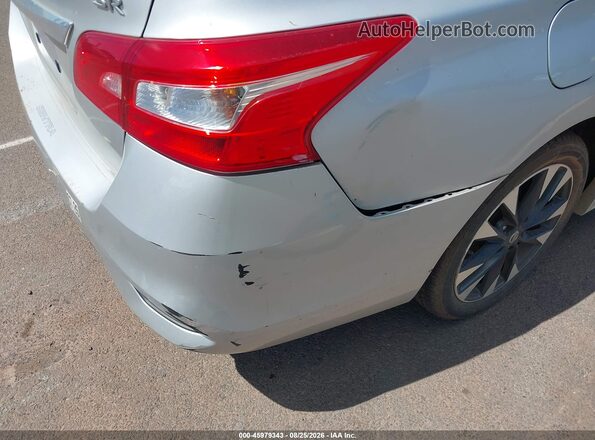 3N1AB7AP8JY320289 2018 NISSAN SENTRA Silver Widok z przodu