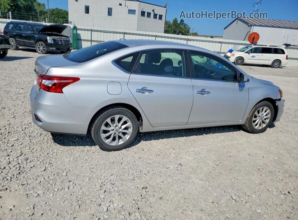 3N1AB7AP8KL610482 2019 NISSAN SENTRA Серебряный Задняя правая четверть