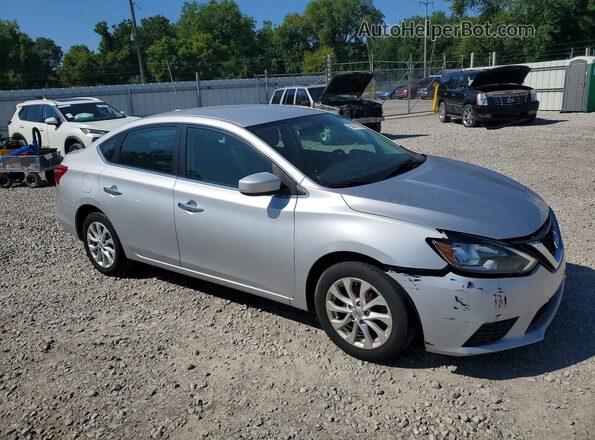 3N1AB7AP8KL610482 2019 NISSAN SENTRA Серебряный Передняя правая четверть