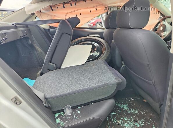3N1AB7AP9HY393715 2017 NISSAN SENTRA Silver Rear seats view