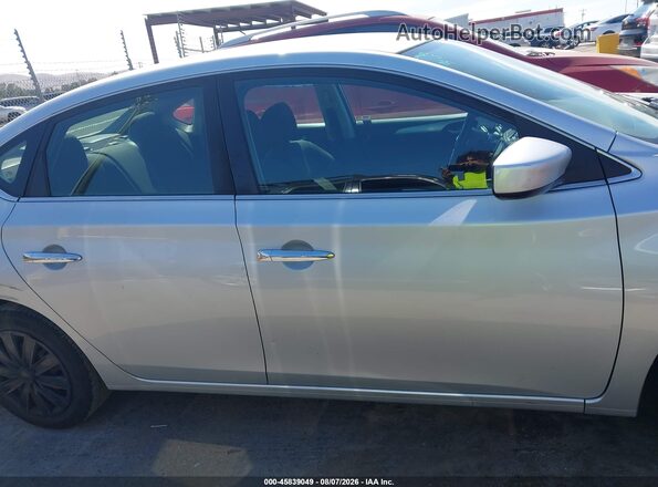 3N1AB7AP9KY262677 2019 NISSAN SENTRA Silver Rear interior view