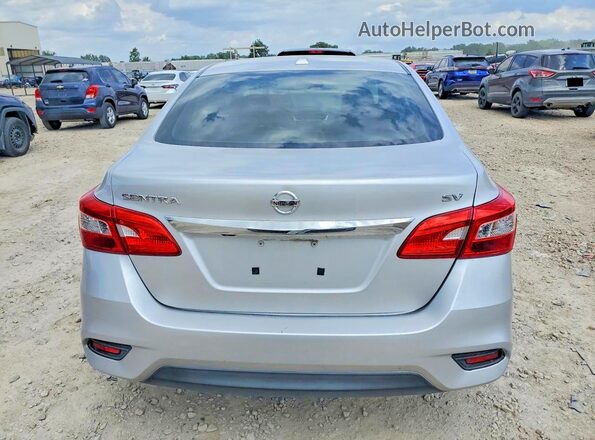 3N1AB7APXGY242641 2016 NISSAN SENTRA Серебряный Вид сзади