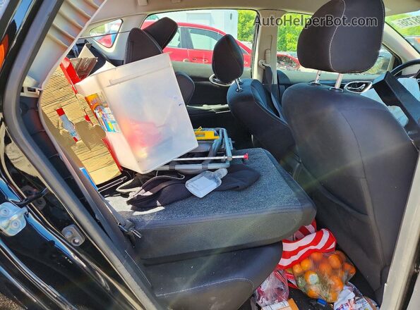 3N1AB7APXJY273718 2018 NISSAN SENTRA Black Rear seats view