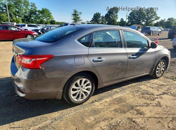 3N1AB7APXKL607213 2019 NISSAN SENTRA Серебряный Задняя правая четверть
