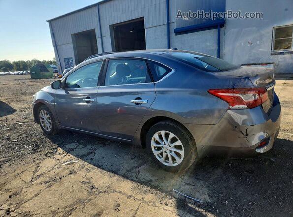3N1AB7APXKL607213 2019 NISSAN SENTRA Серебряный Задняя левая четверть