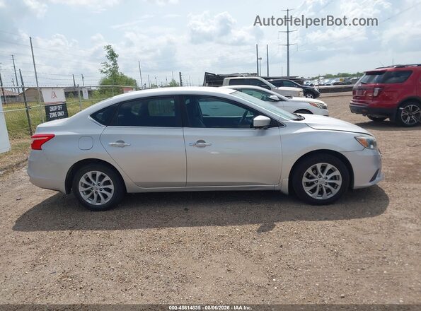 3N1AB7APXKL608216 2019 NISSAN SENTRA Silver Widok wnętrza z tyłu