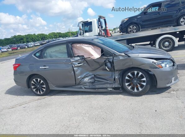 3N1AB7APXKY347673 2019 NISSAN SENTRA Gray Rear interior view