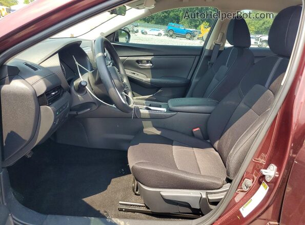 3N1AB8CV3PY272386 2023 NISSAN SENTRA Maroon Vista interior delantera
