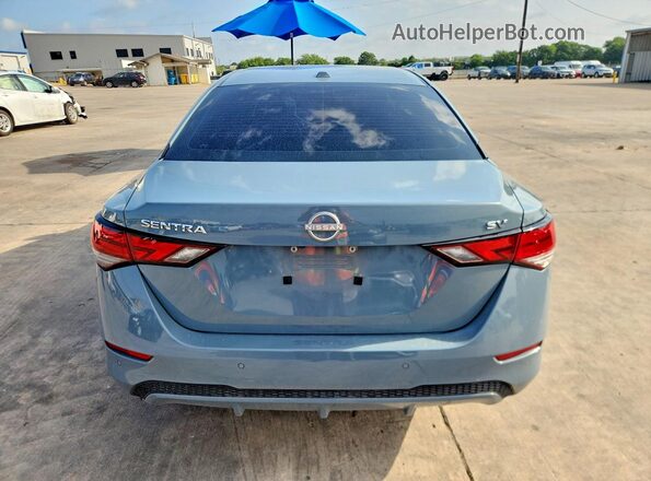 3N1AB8CV6RY219409 2024 NISSAN SENTRA Gray Rear view