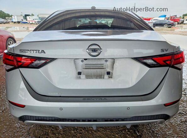 3N1AB8CVXPY230717 2023 NISSAN SENTRA Серебряный Вид сзади