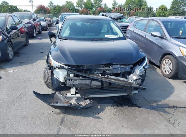 3N1AB8CVXPY259764 2023 NISSAN SENTRA Black Սալոնի հետևի տեսք