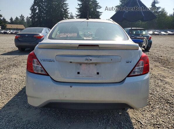3N1CN7AP1KL857553 2019 NISSAN VERSA Серебряный Вид сзади