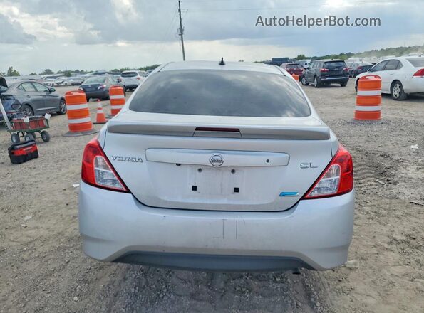 3N1CN7AP3GL889055 2016 NISSAN VERSA Silver Rear view
