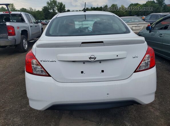 3N1CN7AP3KL879084 2019 NISSAN VERSA White Rear seats view