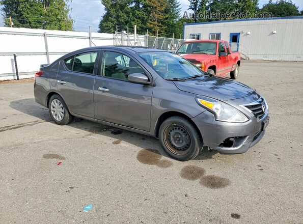 3N1CN7AP5KL815077 2019 NISSAN VERSA Серый Передняя правая четверть