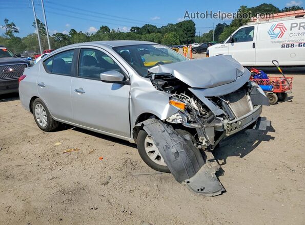 3N1CN7AP5KL852405 2019 NISSAN VERSA Серебряный Передняя правая четверть