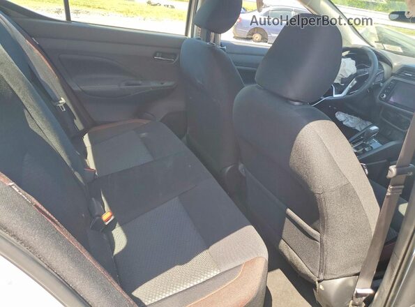 3N1CN8FV9PL856770 2023 NISSAN VERSA White Vista de los asientos traseros