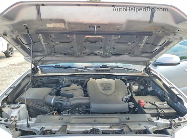 3TMAZ5CN1MM143945 2021 TOYOTA TACOMA Silver Rear interior view