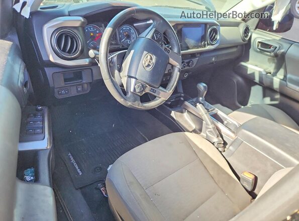 3TMAZ5CN2JM061878 2018 TOYOTA TACOMA Black Dashboard view