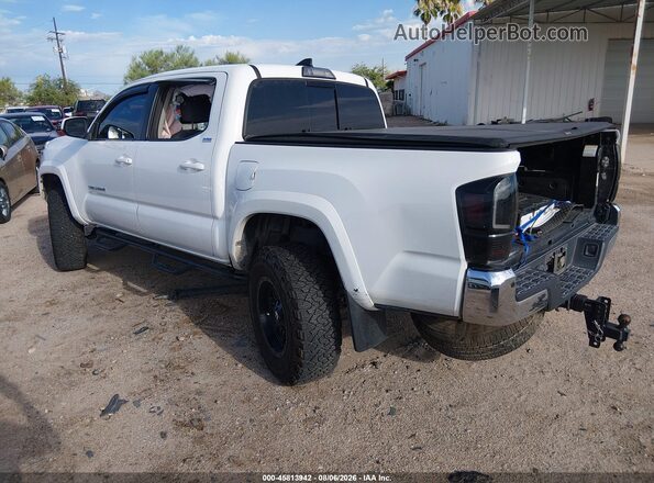 3TMAZ5CN3JM056415 2018 TOYOTA TACOMA White Trasero izquierdo