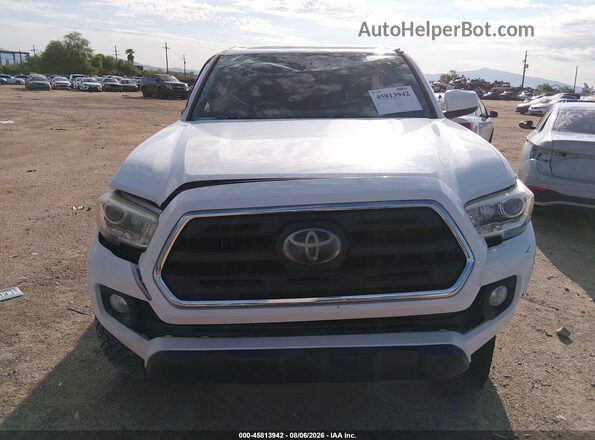 3TMAZ5CN3JM056415 2018 TOYOTA TACOMA White Vista del salpicadero