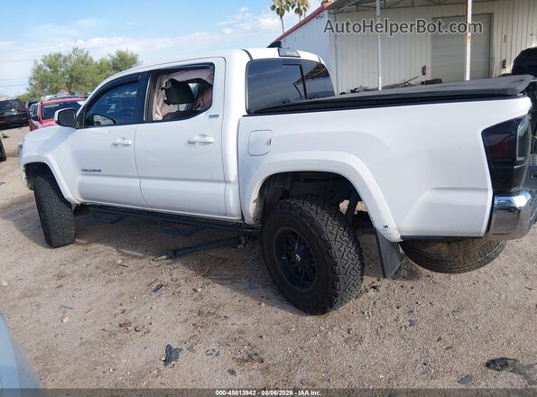 3TMAZ5CN3JM056415 2018 TOYOTA TACOMA White Vista interior trasera