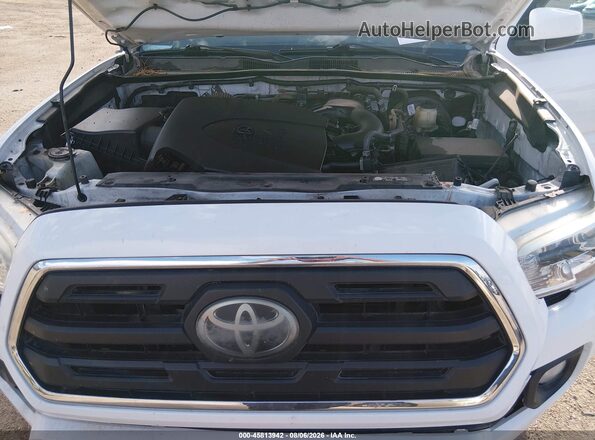 3TMAZ5CN3JM056415 2018 TOYOTA TACOMA White Vista trasera
