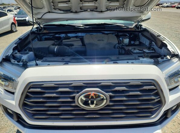 3TMAZ5CN5MM154964 2021 TOYOTA TACOMA White Սալոնի հետևի տեսք