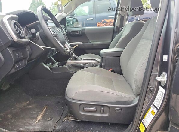 3TMAZ5CN6MM149515 2021 TOYOTA TACOMA Gray Front interior view