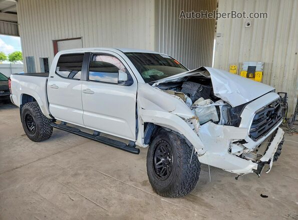3TMAZ5CN7JM057115 2018 TOYOTA TACOMA White Передня права чверть