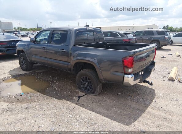3TMAZ5CN7PM214067 2023 TOYOTA TACOMA Gray Trasero izquierdo