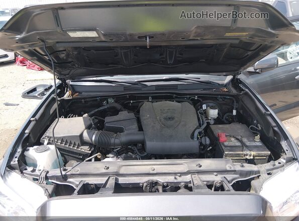 3TMAZ5CN7PM214067 2023 TOYOTA TACOMA Gray Vista trasera