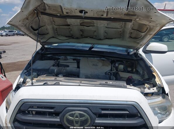 3TMAZ5CN9KM085080 2019 TOYOTA TACOMA White Vista trasera