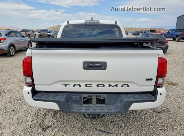 3TMCZ5AN0JM184929 2018 TOYOTA TACOMA White Rear view