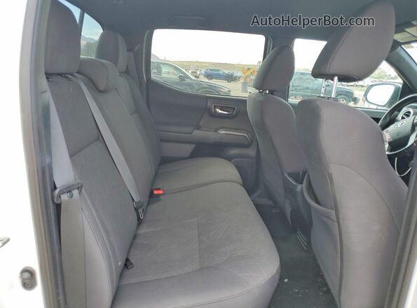3TMCZ5AN0JM184929 2018 TOYOTA TACOMA White Rear seats view