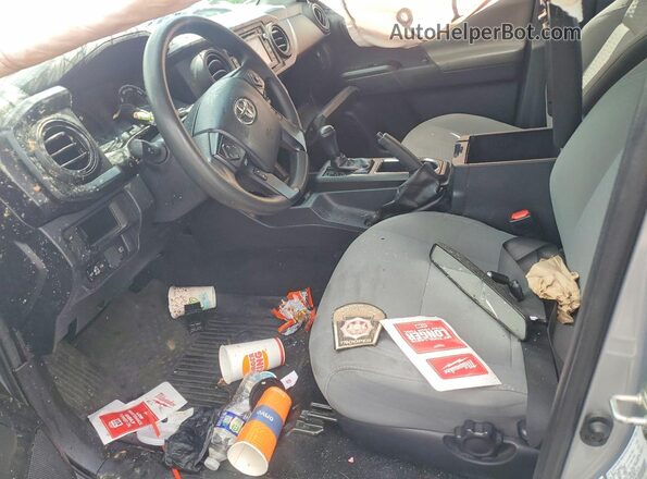 3TMCZ5AN0KM262949 2019 TOYOTA TACOMA Silver Front interior view