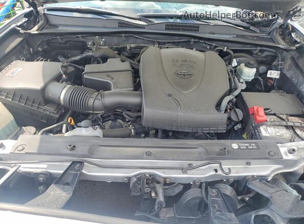 3TMCZ5AN0KM262949 2019 TOYOTA TACOMA Silver Rear interior view