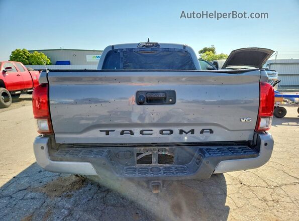 3TMCZ5AN0KM279203 2019 TOYOTA TACOMA Silver Вид ззаду