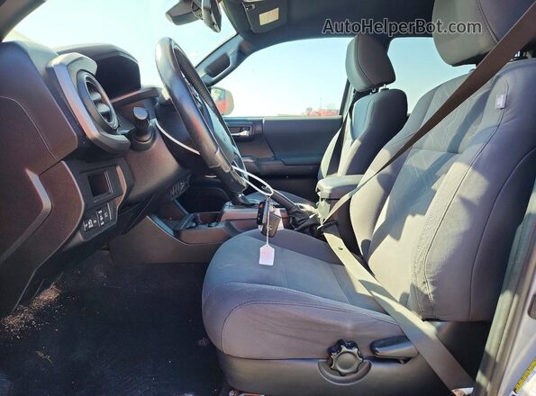 3TMCZ5AN0KM279203 2019 TOYOTA TACOMA Silver Вид салону спереду