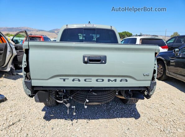 3TMCZ5AN0PM575944 2023 TOYOTA TACOMA Бежевый Вид сзади