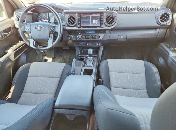 3TMCZ5AN0PM575944 2023 TOYOTA TACOMA Бежевый Вид панели приборов