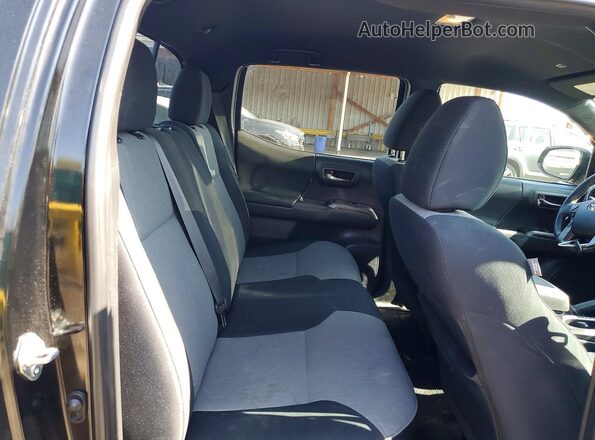 3TMCZ5AN0PM631106 2023 TOYOTA TACOMA Black Вид задніх сидінь