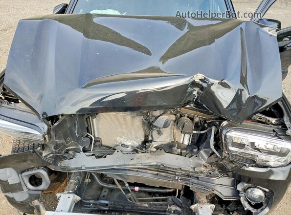 3TMCZ5AN0PM639688 2023 TOYOTA TACOMA Black Вид задньої частини салону