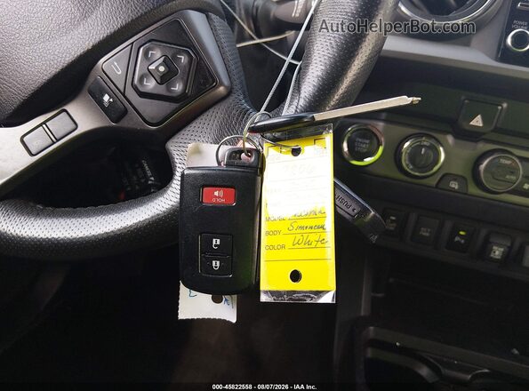 3TMCZ5AN1NM475929 2022 TOYOTA TACOMA Белый Вид панели приборов
