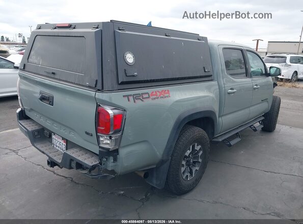 3TMCZ5AN1PM556738 2023 TOYOTA TACOMA Зеленый Задняя правая четверть