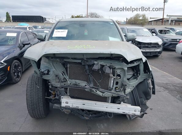 3TMCZ5AN1PM556738 2023 TOYOTA TACOMA Зеленый Вид задней части салона