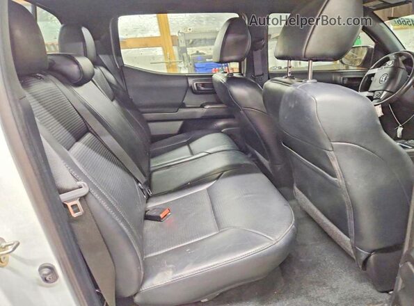 3TMCZ5AN2KM208598 2019 TOYOTA TACOMA White Vista de los asientos traseros