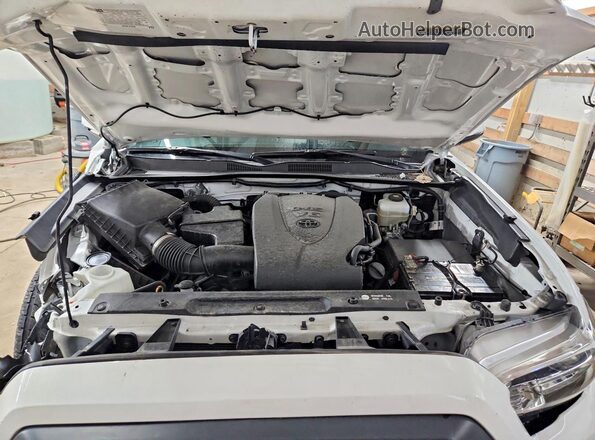 3TMCZ5AN2KM208598 2019 TOYOTA TACOMA White Vista interior trasera