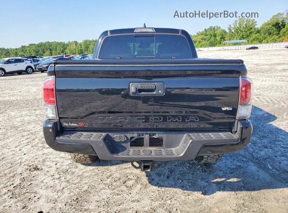 3TMCZ5AN2PM560488 2023 TOYOTA TACOMA Black Հետևի տեսք