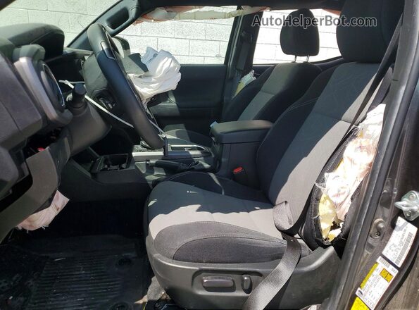 3TMCZ5AN2PM573113 2023 TOYOTA TACOMA Black Widok wnętrza z przodu